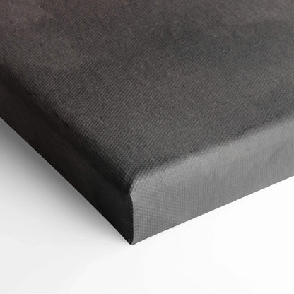 Black canvas with subtle abstract texture wrapped around thick wooden frame wall art.