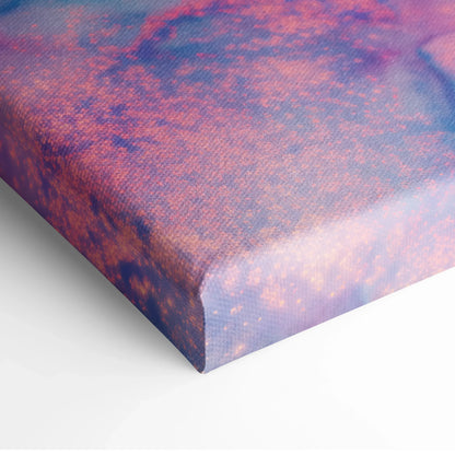 Close-up of vibrant purple and orange abstract pattern on textured canvas art edge for wall art decor.