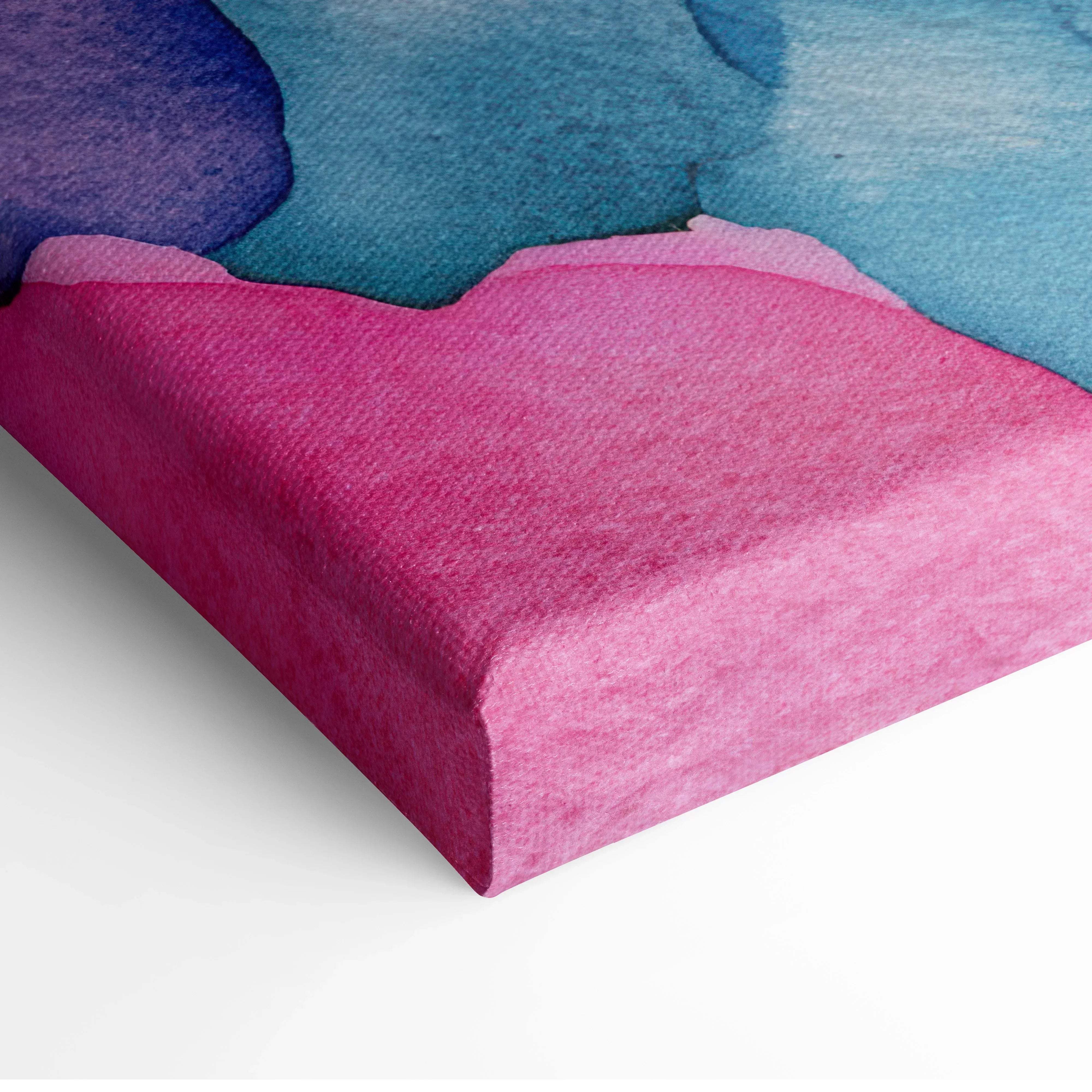 A vibrant abstract watercolor swirls canvas wall art with bold pink teal and deep blue on textured fabric for modern decor