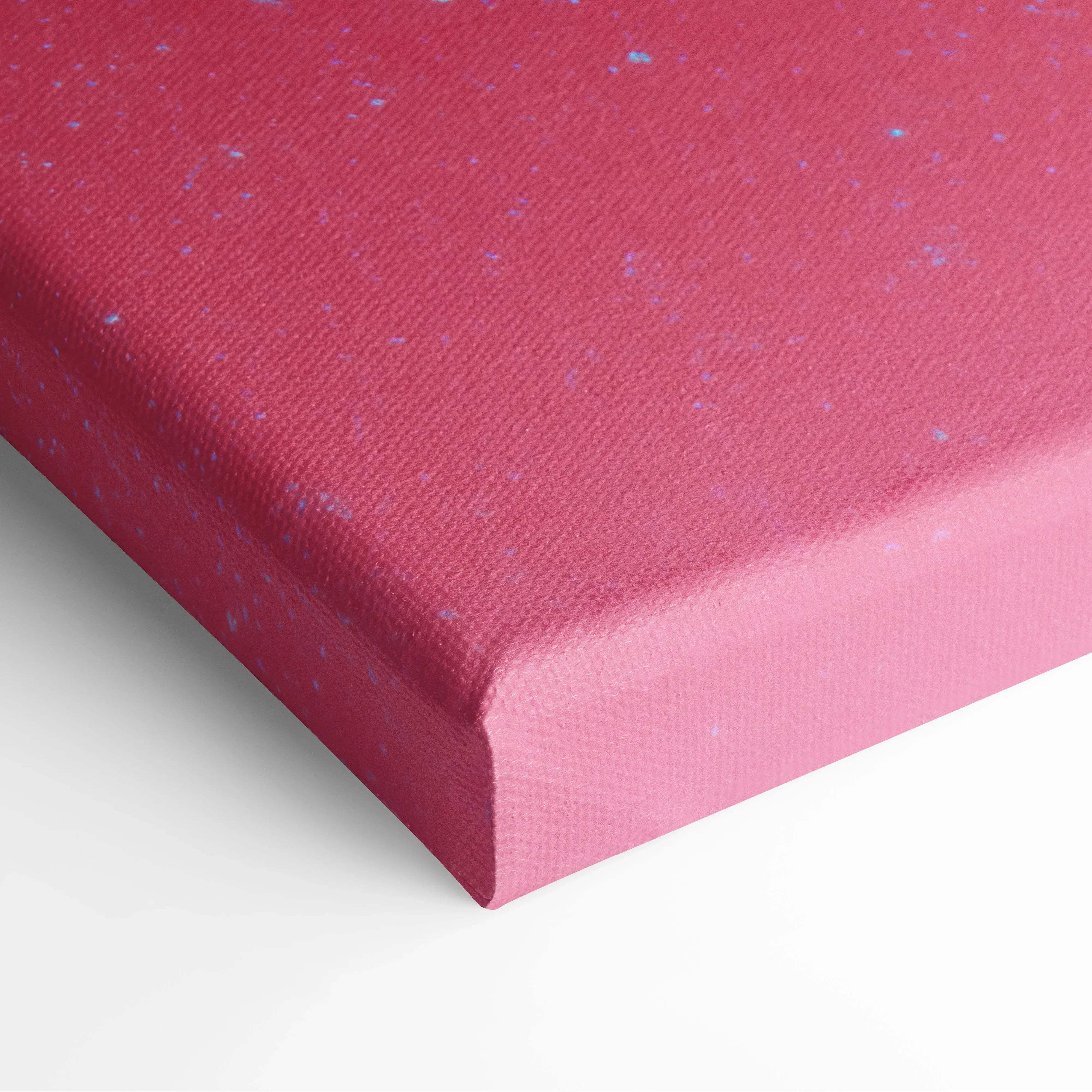 A vibrant pink abstract gradient canvas wall art with textured surface and subtle blue speckles for modern interiors