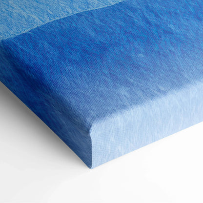 Close-up of canvas art corner with textured blue gradient and abstract digital brush strokes.