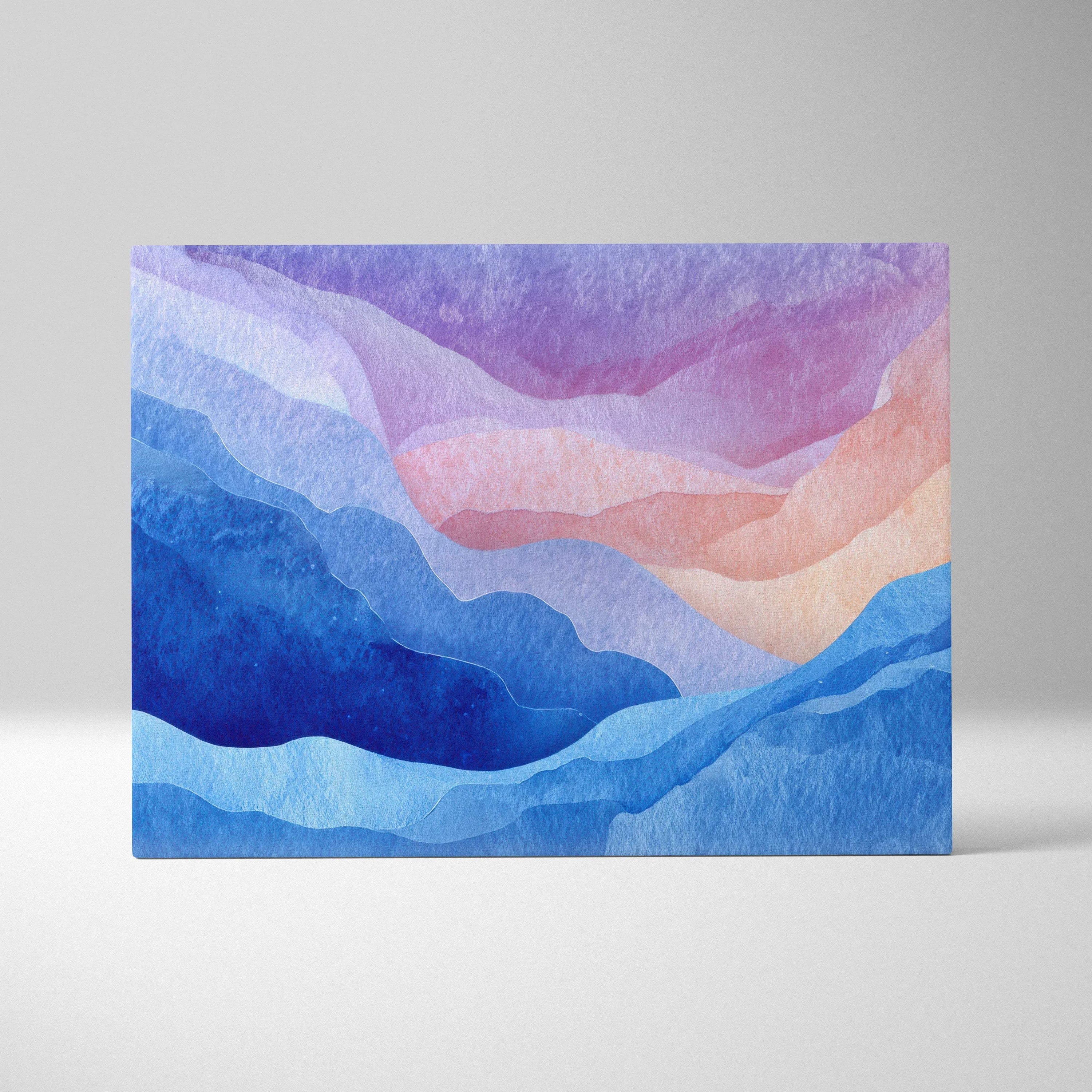 Abstract canvas wall art with layered waves in blue, purple, and soft peach tones.