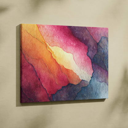 Vibrant abstract canvas wall art with layered hues of pink, orange, yellow, and blue in fluid shapes.