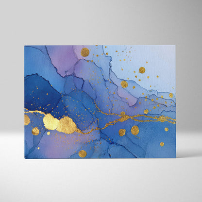 Coastal luxe abstract fluid art canvas wall art featuring blue and purple hues with gold leaf accents