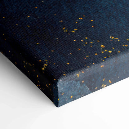 Close-up of dark blue canvas wall art with scattered gold flecks and textured surface.