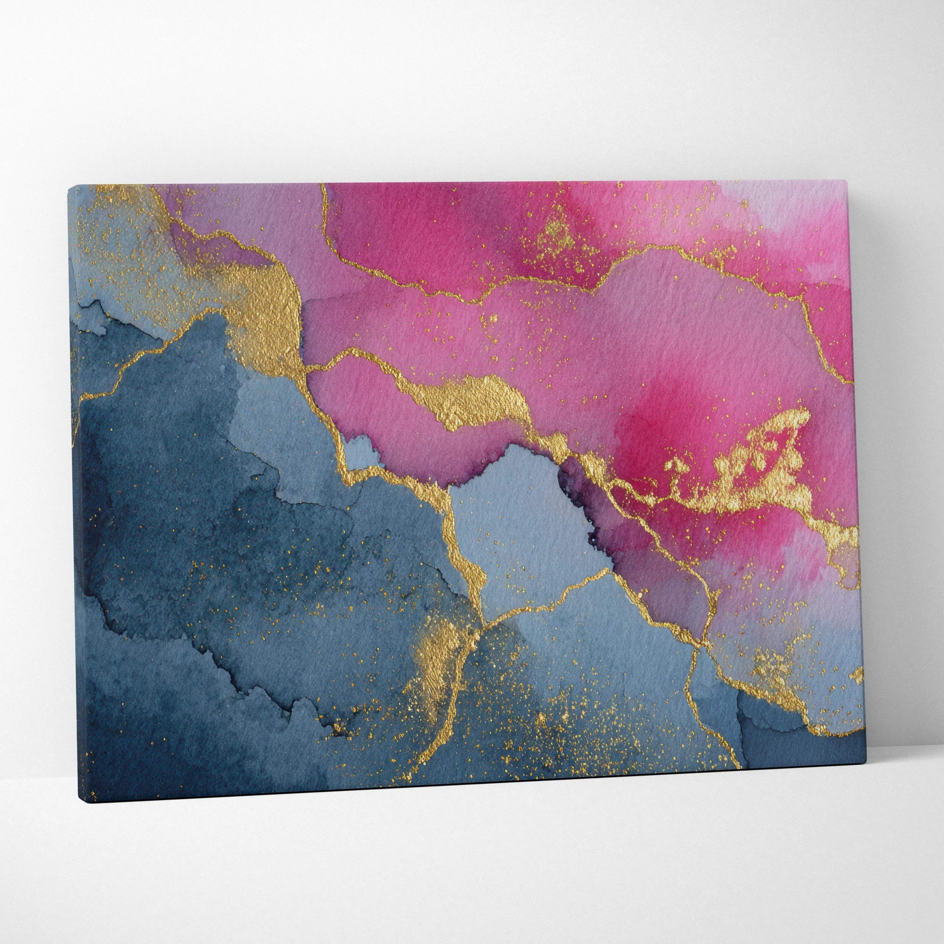 Abstract canvas wall art with pink and blue color blocks accented by gold metallic streaks.