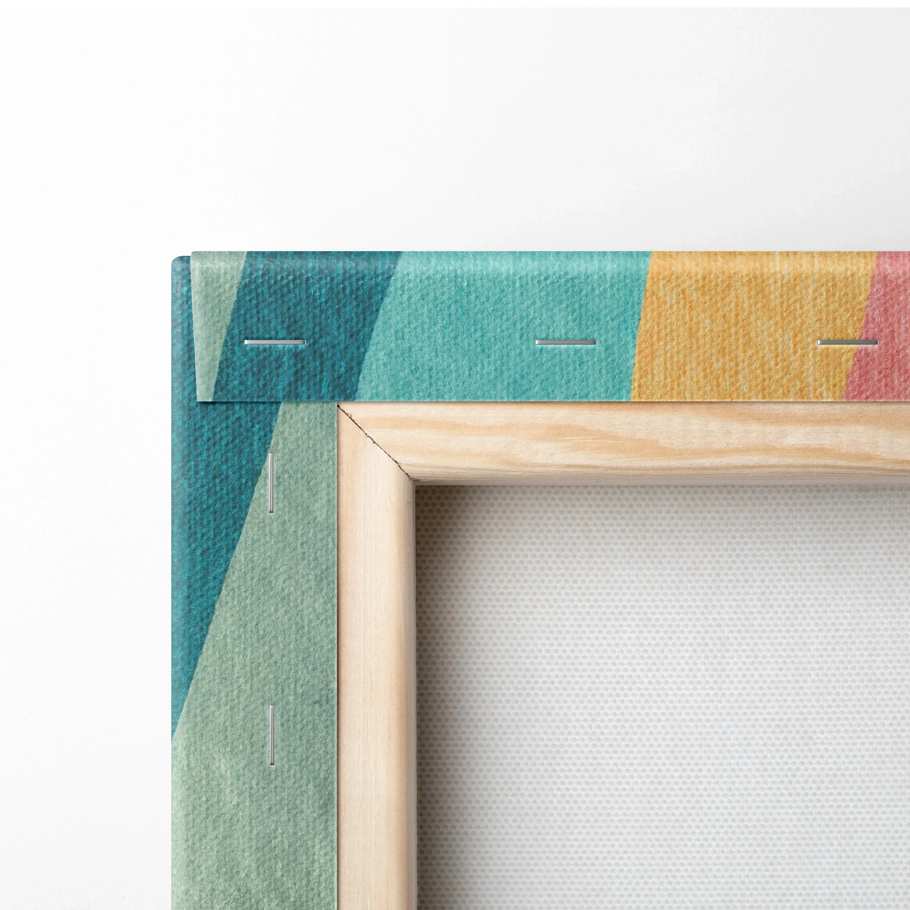 Close-up of vibrant abstract digital art canvas with geometric shapes and visible wooden frame edges.