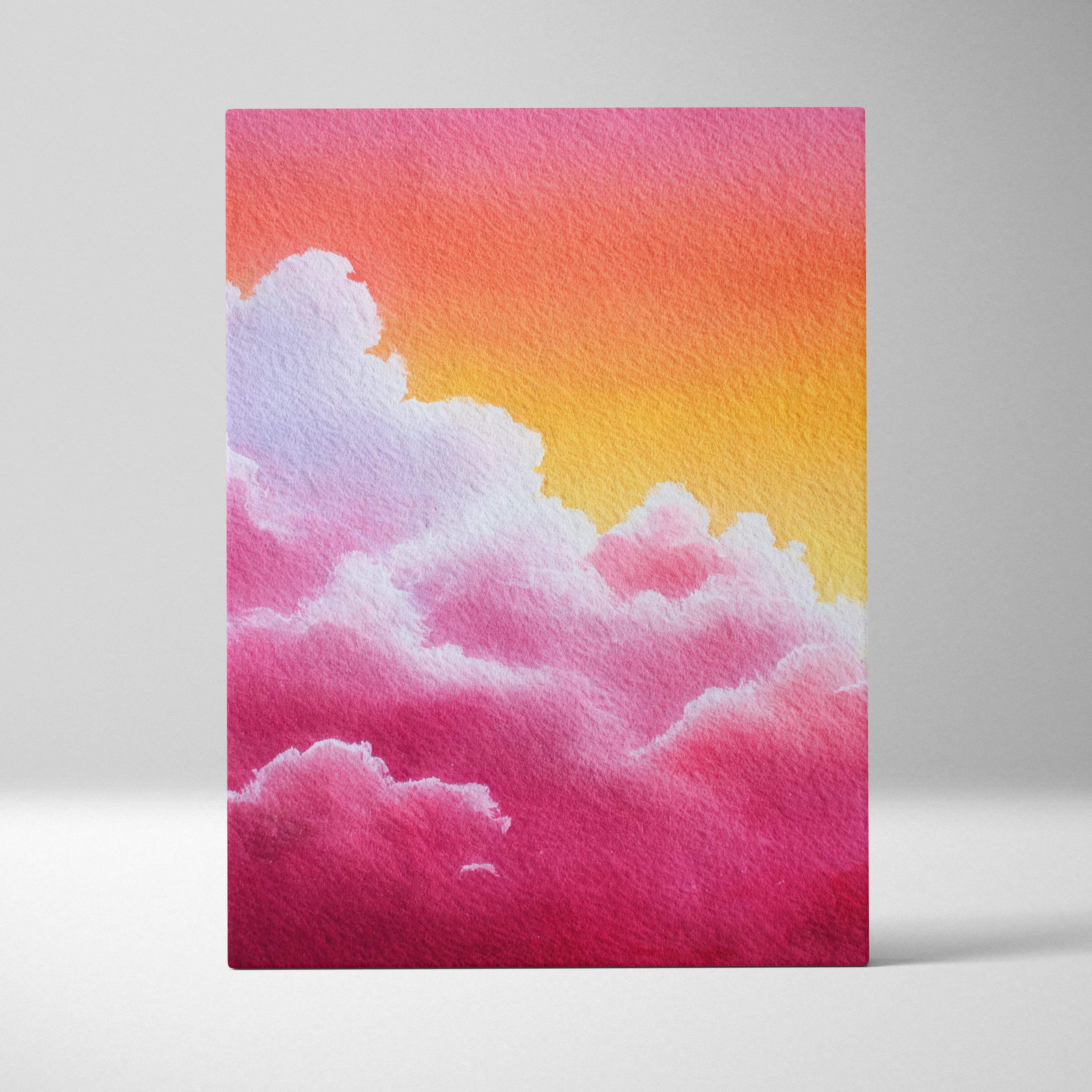 A vibrant watercolor canvas wall art featuring a dreamy abstract sunset sky with pink orange yellow gradient clouds