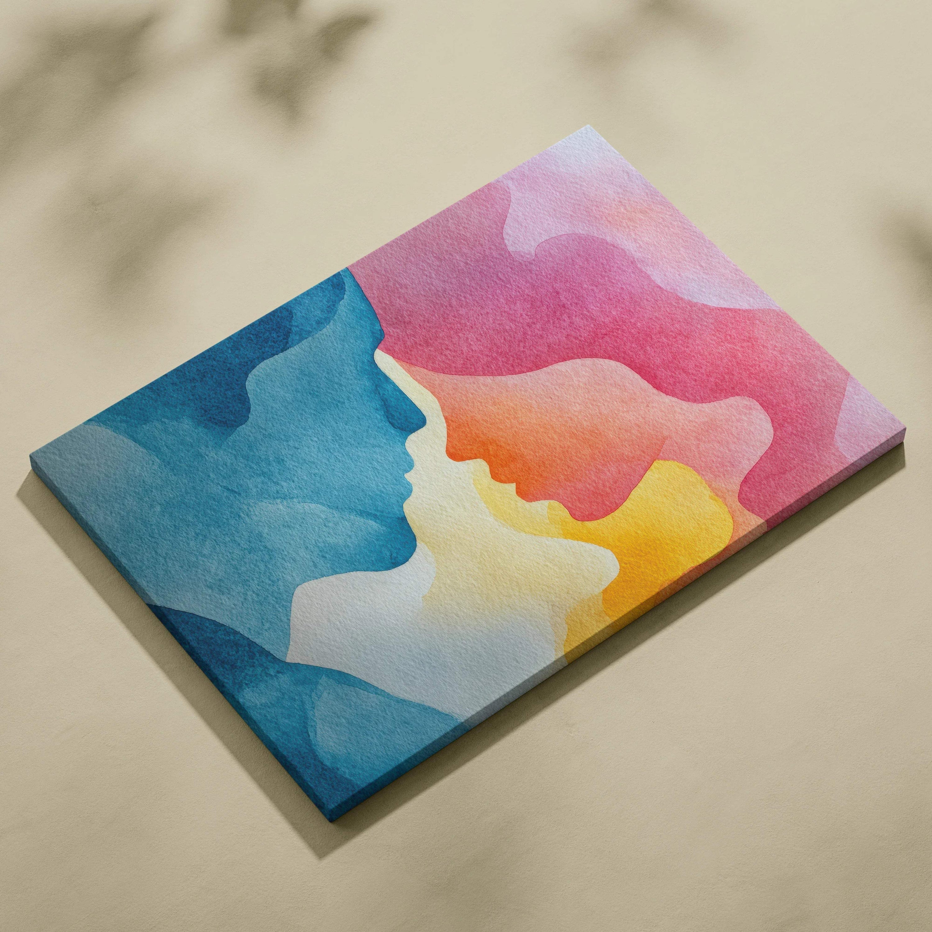 Abstract colorful digital art canvas with blue and pink faces, modern wall art design.