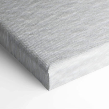 White canvas art print with subtle textured surface, stretched on wooden frame for wall decor.