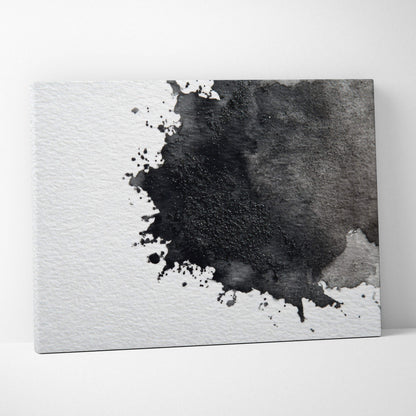 Abstract black ink splash on white textured canvas wall art with subtle gray accents.