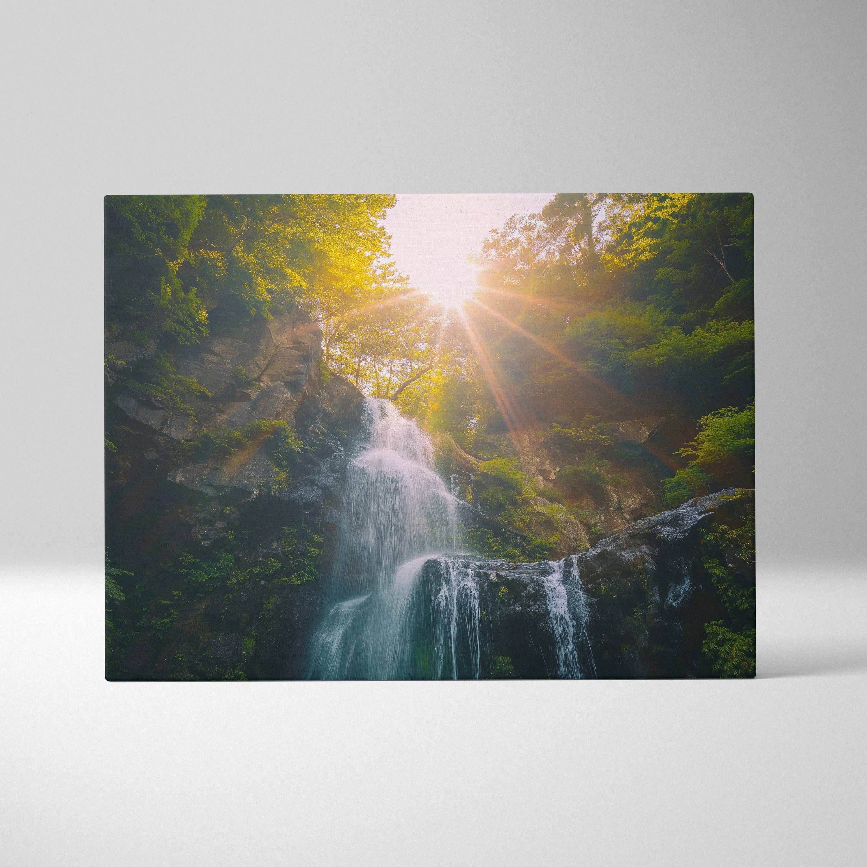 Waterfall nature canvas with sunlight beams over lush green forest, museum-quality wall art decor.