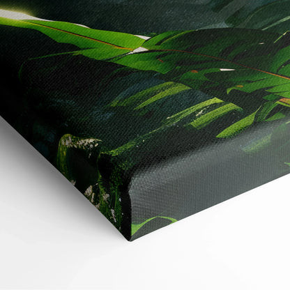 Corner close-up of a textured canvas print featuring dark green tropical forest leaves with sunlight filtering through.