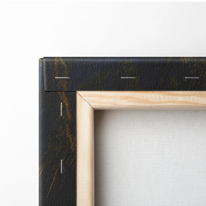 Close-up of wooden stretcher frame and black canvas edge with gold veining on wall art decor piece.