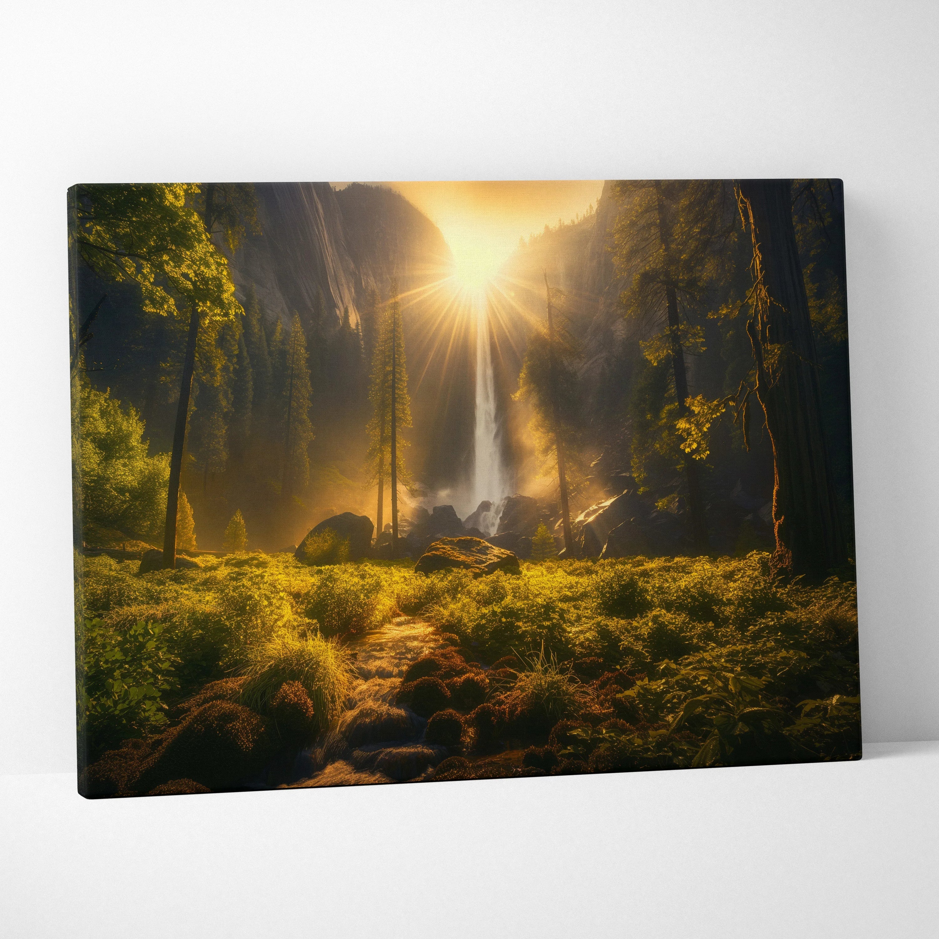 Canvas wall art featuring a sunlit forest waterfall with golden light filtering through trees over lush green moss and rocks.
