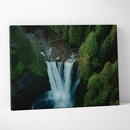 Aerial view forest waterfall canvas wall art with lush green trees and cascading water decor.