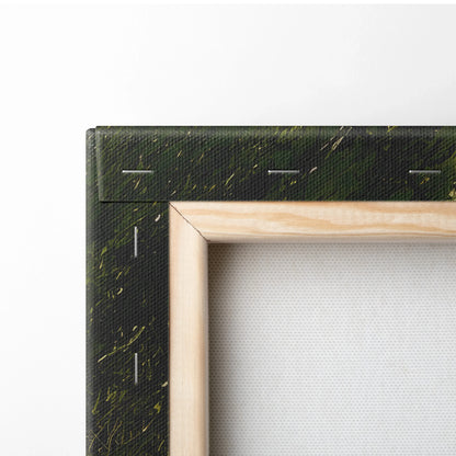 Close-up of raw wood frame and green canvas stapled on the back, showing texture and canvas material.