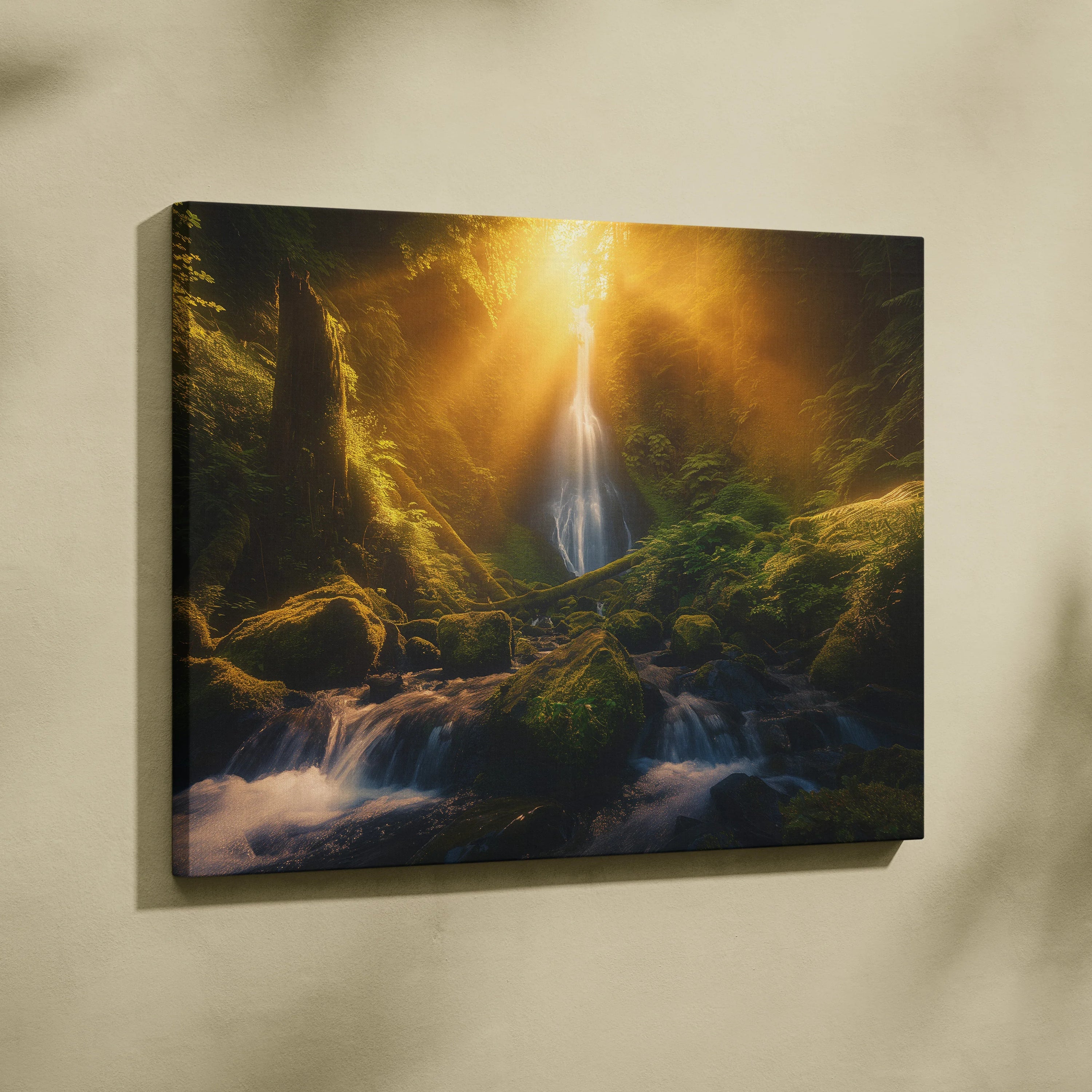 Canvas wall art of a glowing forest waterfall at sunset with warm golden light and lush green moss decor.