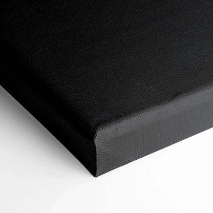 Black gallery-wrapped canvas with textured surface and neatly folded corner edges.