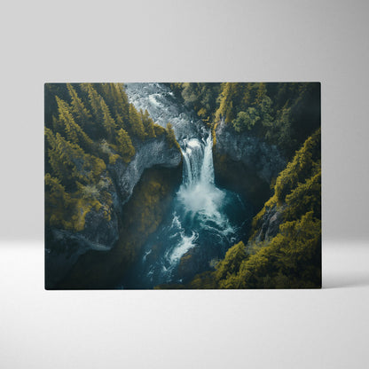 Canvas wall art featuring a vibrant waterfall cascading through rocky cliffs surrounded by lush green forest.