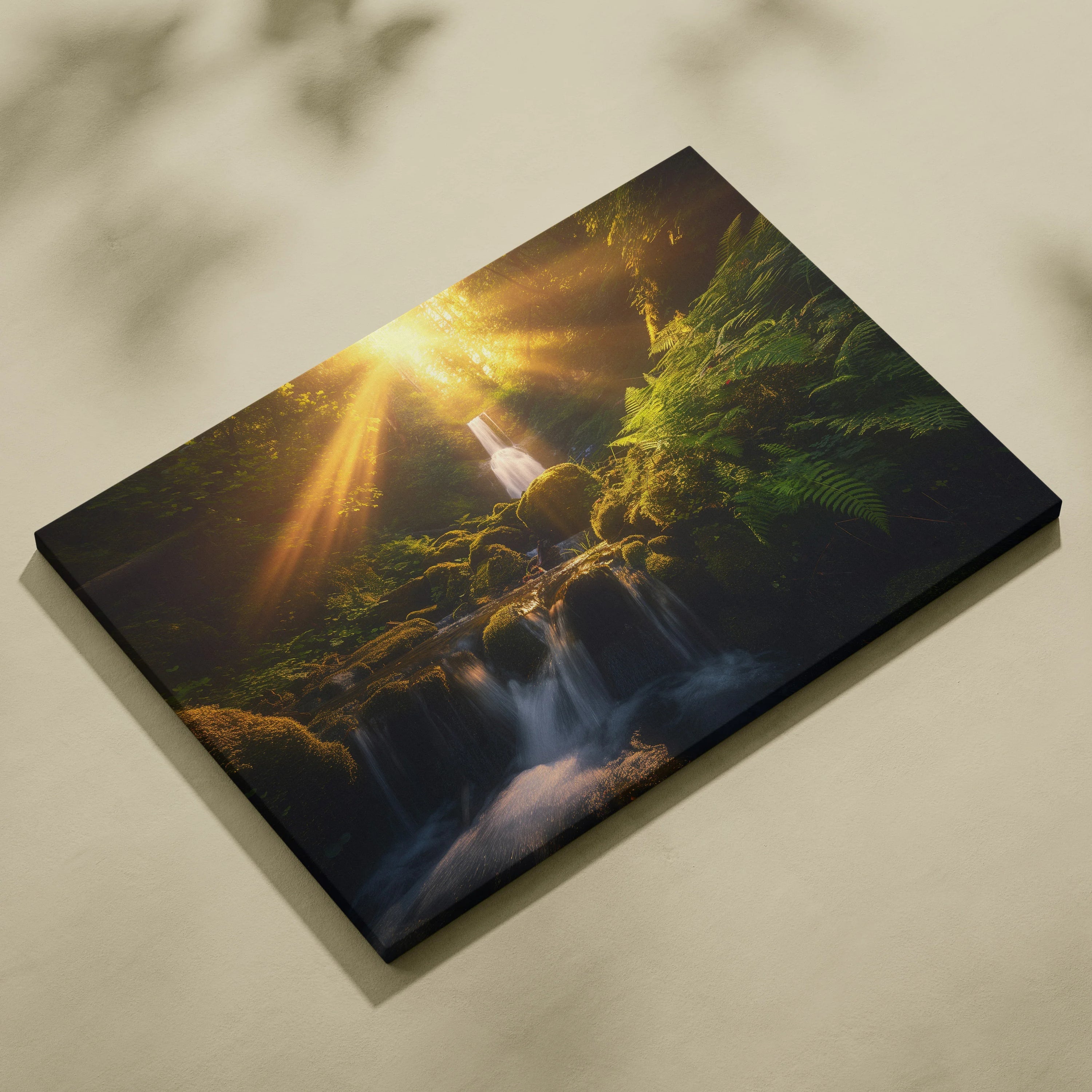 Canvas wall art featuring a vibrant forest scene with sunlight streaming over a cascading waterfall.