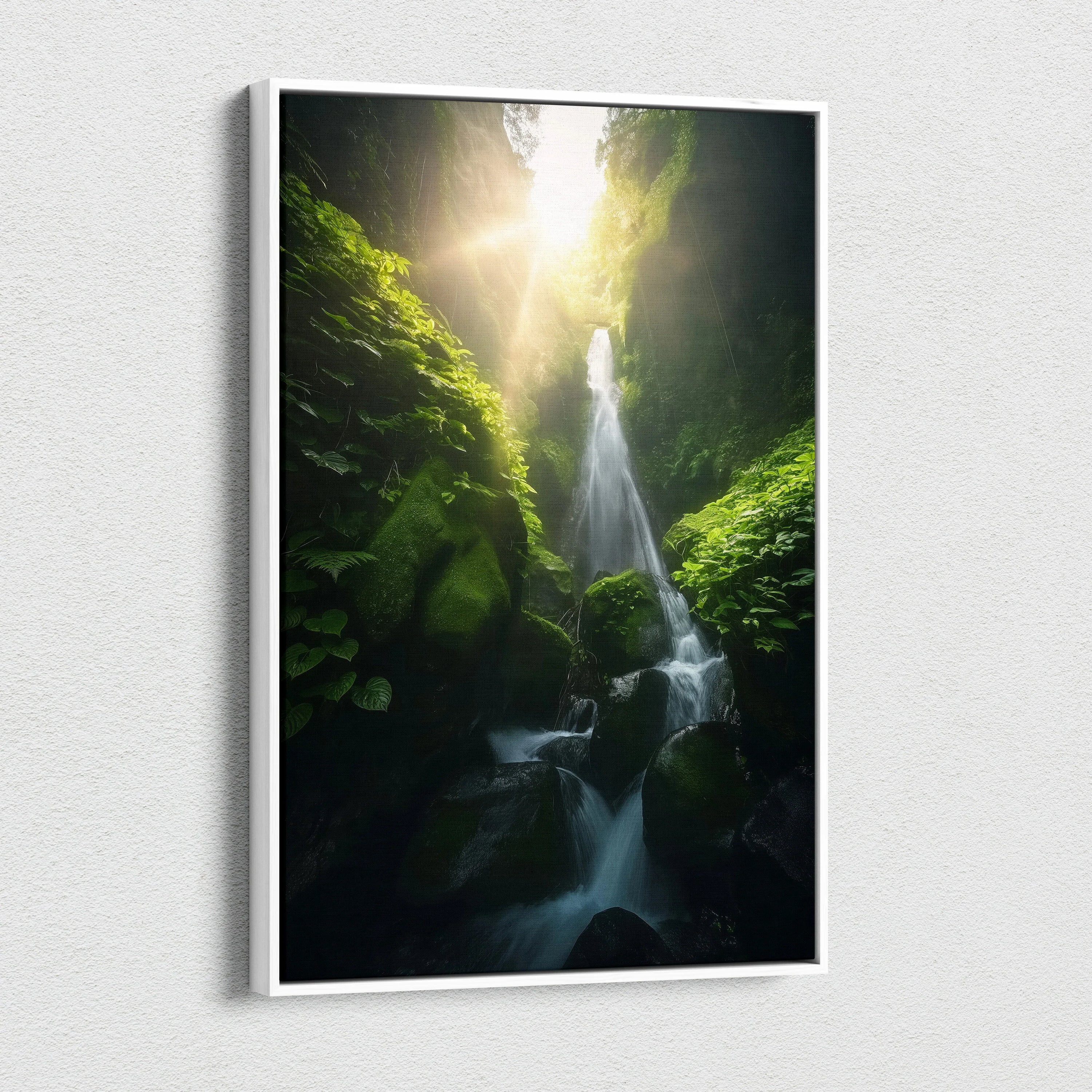 Vertical canvas wall art of a lush green forest waterfall with sunlight streaming through dense foliage.