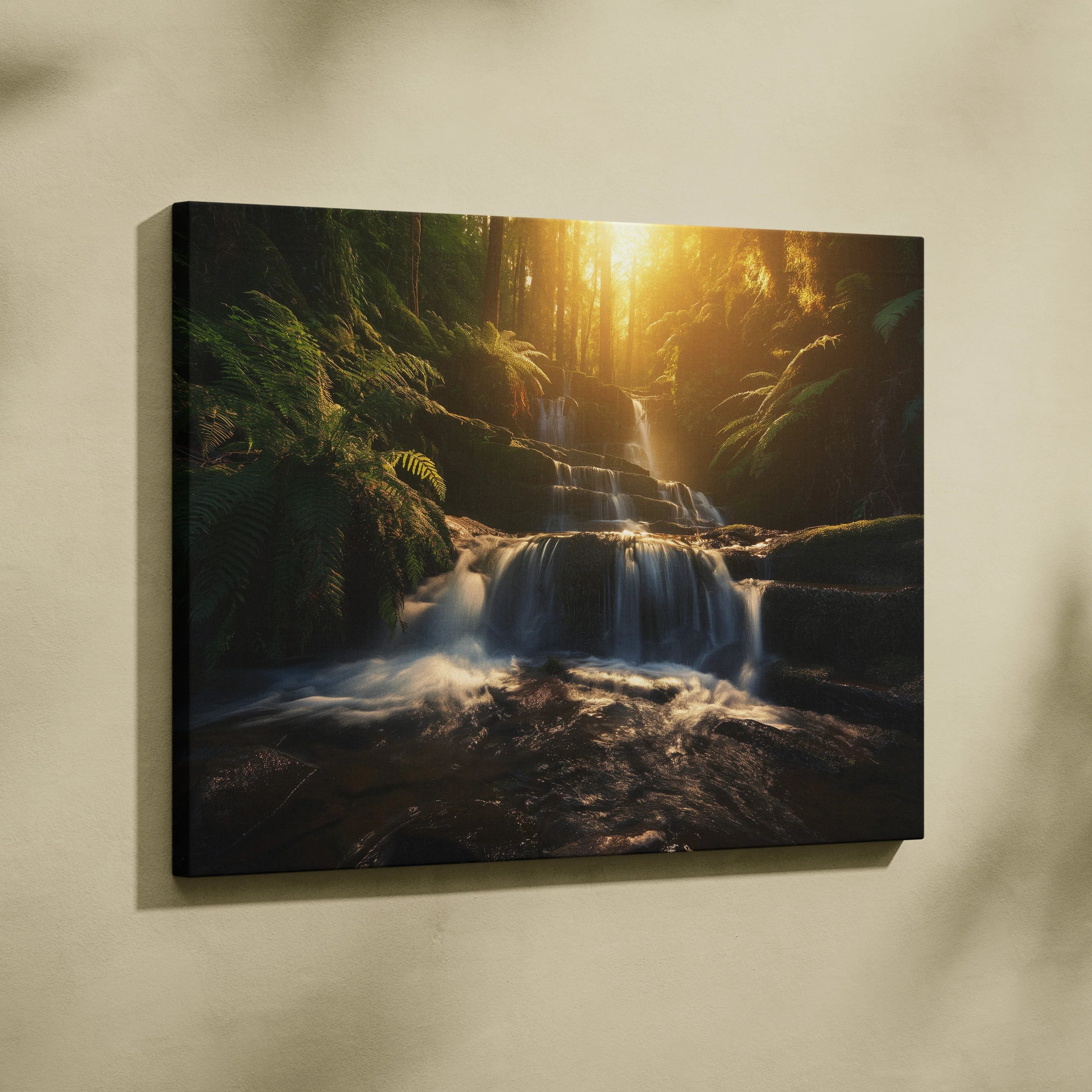Waterfall in lush forest with sunlight streaming through trees canvas wall art decor.