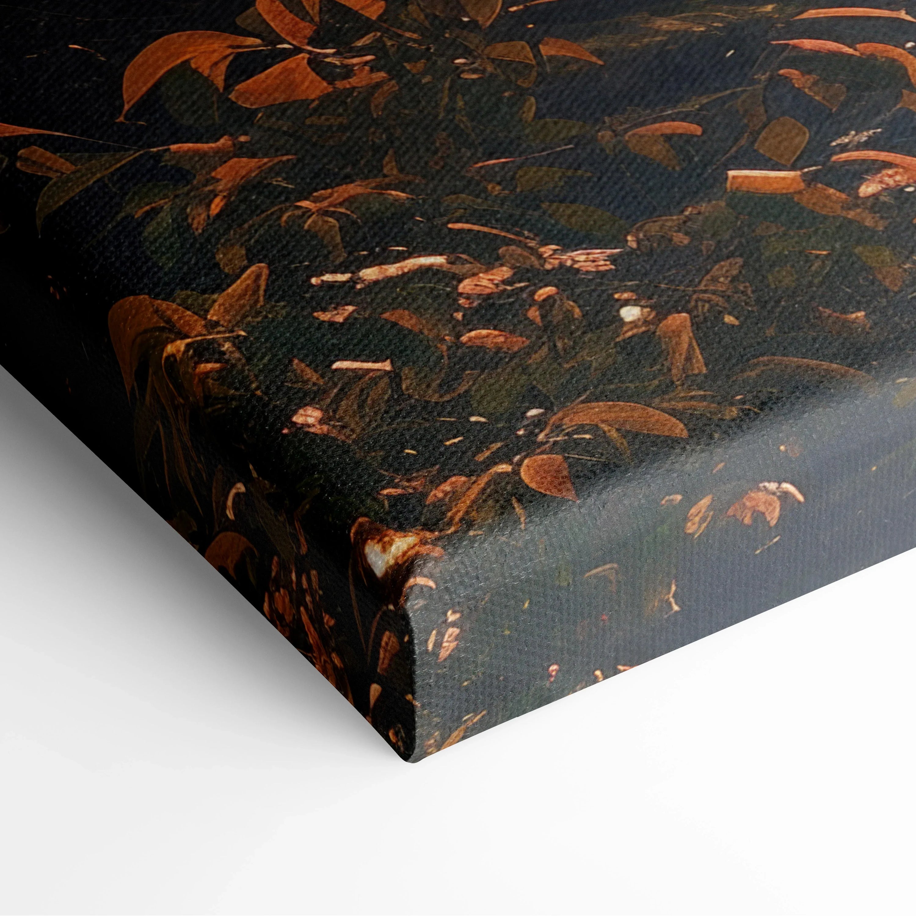 Close-up of textured canvas wall art featuring dark autumn forest scene with brown leaves and hints of orange light.