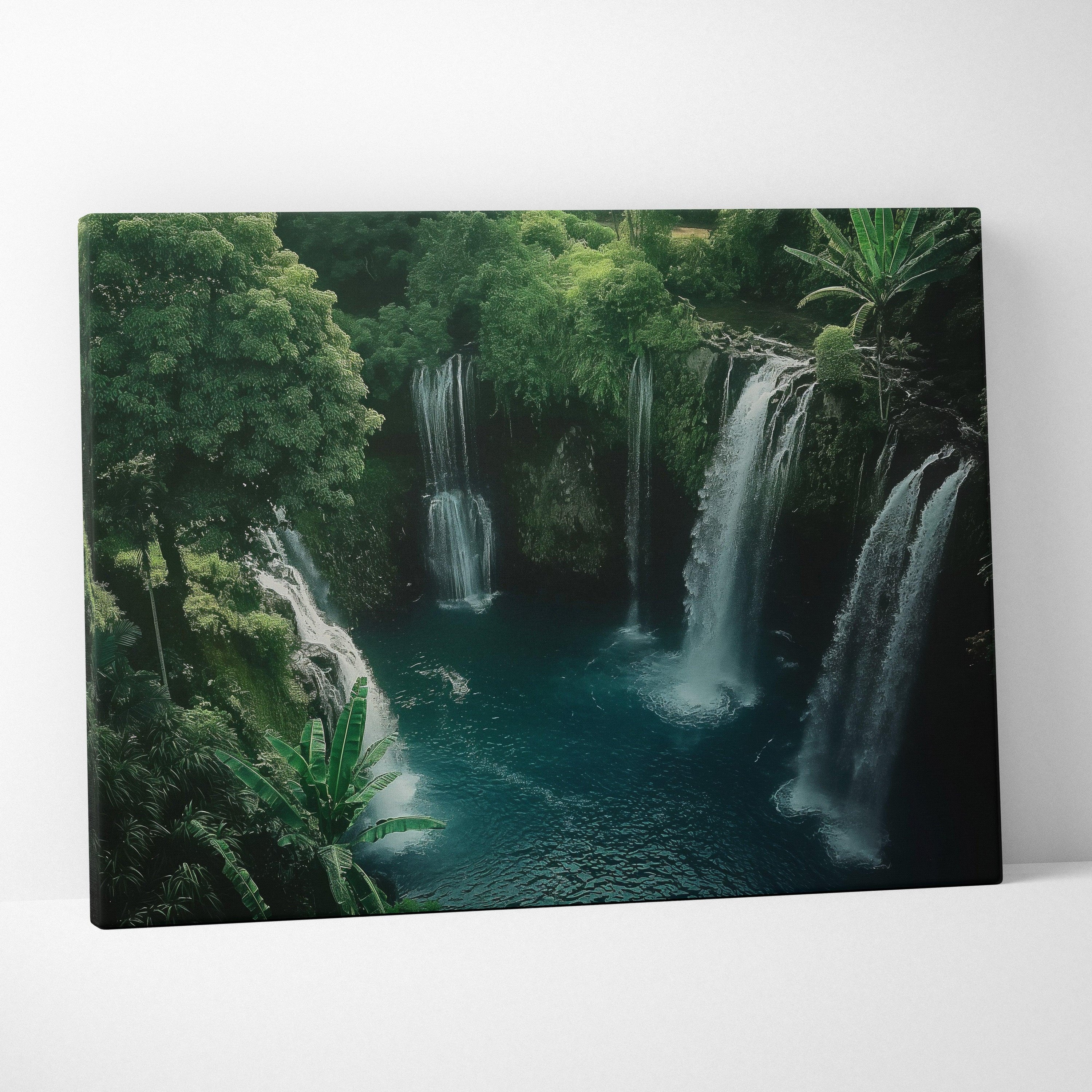 Canvas wall art featuring a high-resolution nature scene of lush green trees and cascading waterfalls over a turquoise pool.