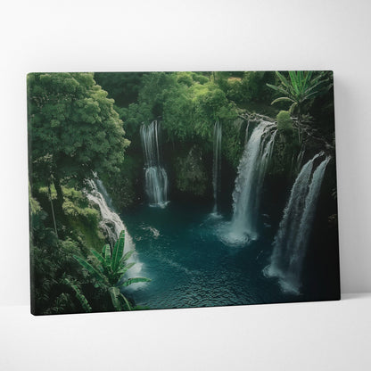 Canvas wall art featuring a high-resolution nature scene of lush green trees and cascading waterfalls over a turquoise pool.
