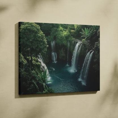 Canvas wall art featuring a vibrant turquoise pool beneath cascading waterfalls surrounded by lush green foliage.