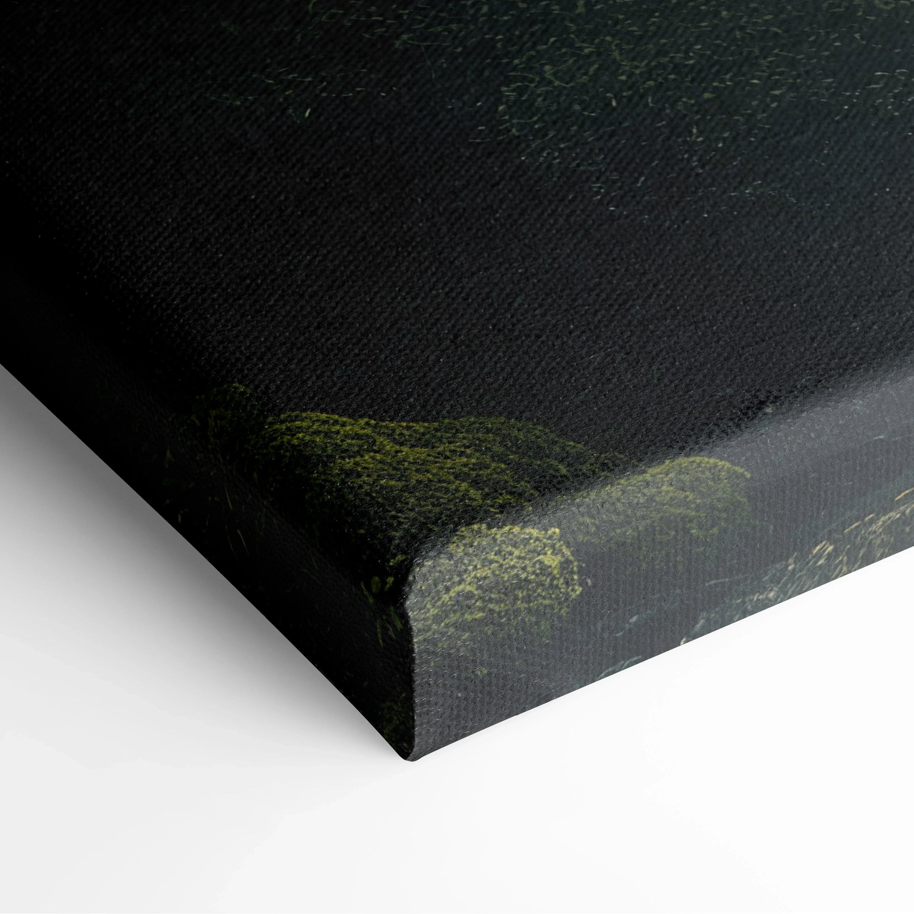 Close-up of dark canvas wall art corner with subtle green moss texture, forest waterfall decor detail.