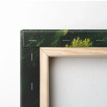 Wood-framed canvas print with waterfall and lush green forest wall art decor.