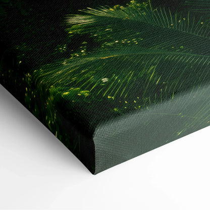 Close-up of green leafy forest waterfall canvas wall art with textured decor surface.