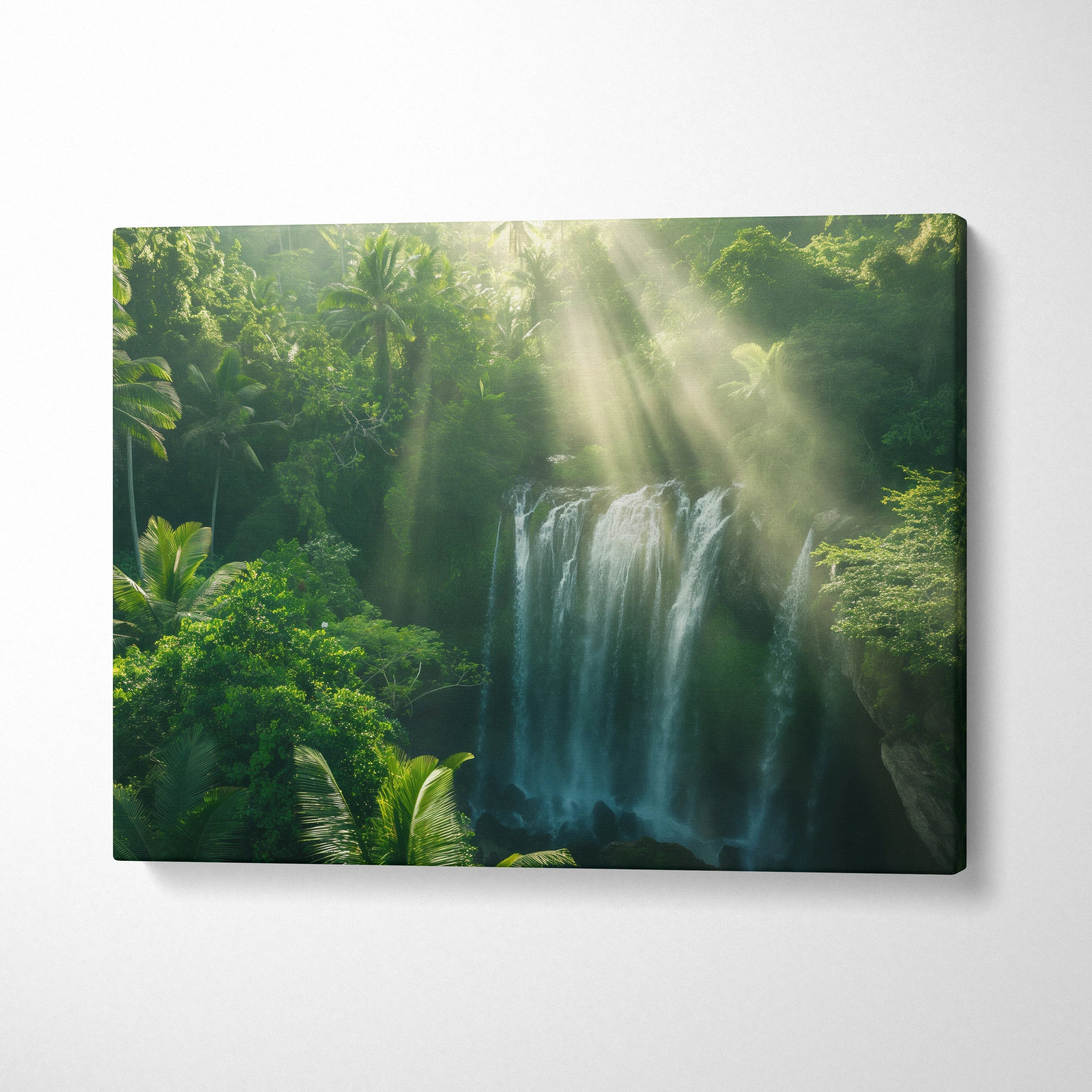 Canvas wall art of a lush forest waterfall with sunbeams streaming through green foliage decor.