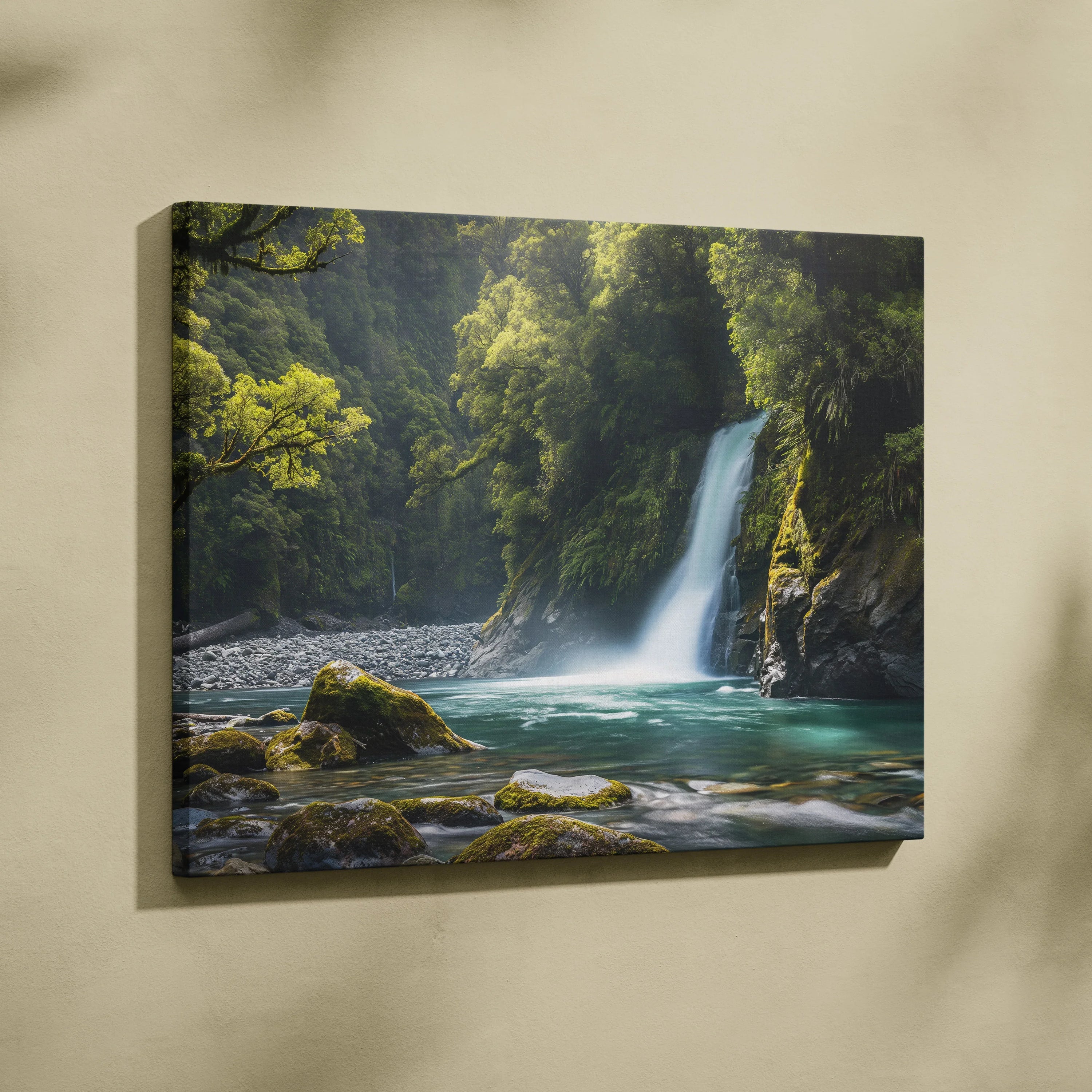 Canvas wall art featuring a turquoise pool with a cascading waterfall surrounded by moss-covered rocks and lush forest.