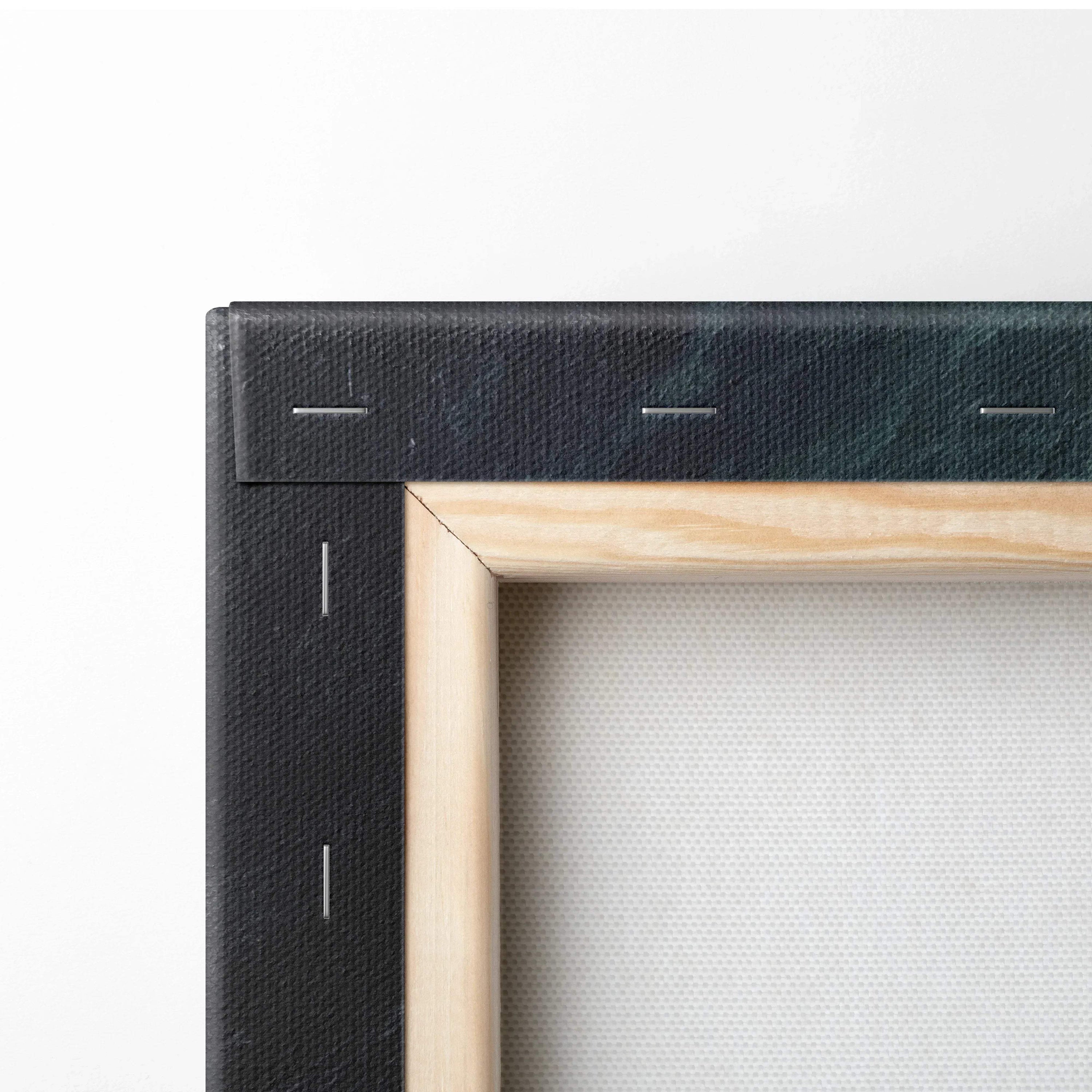 Close-up of wooden frame corner with black canvas stretched and stapled for wall art decor.