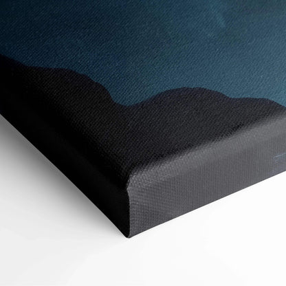 Dark canvas wall art print with deep blue and black abstract shapes, textured fabric surface.