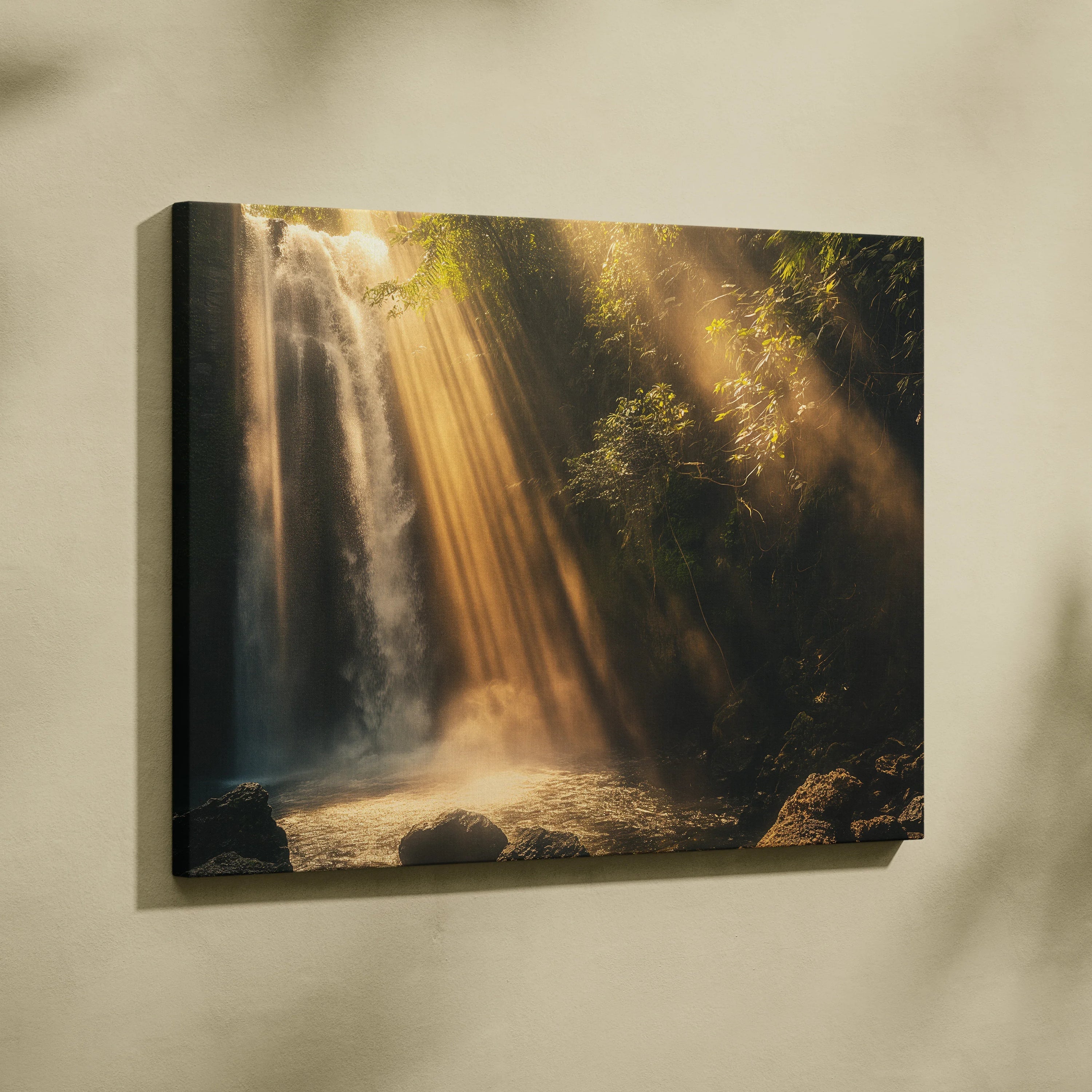 Canvas wall art featuring a forest waterfall with golden sunlight streaming through trees into misty water below.