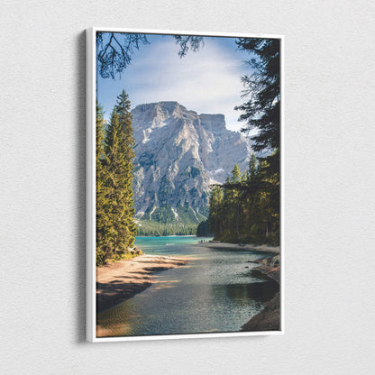 White-framed canvas wall art featuring a serene green blue mountain lake with alpine forest landscape decor