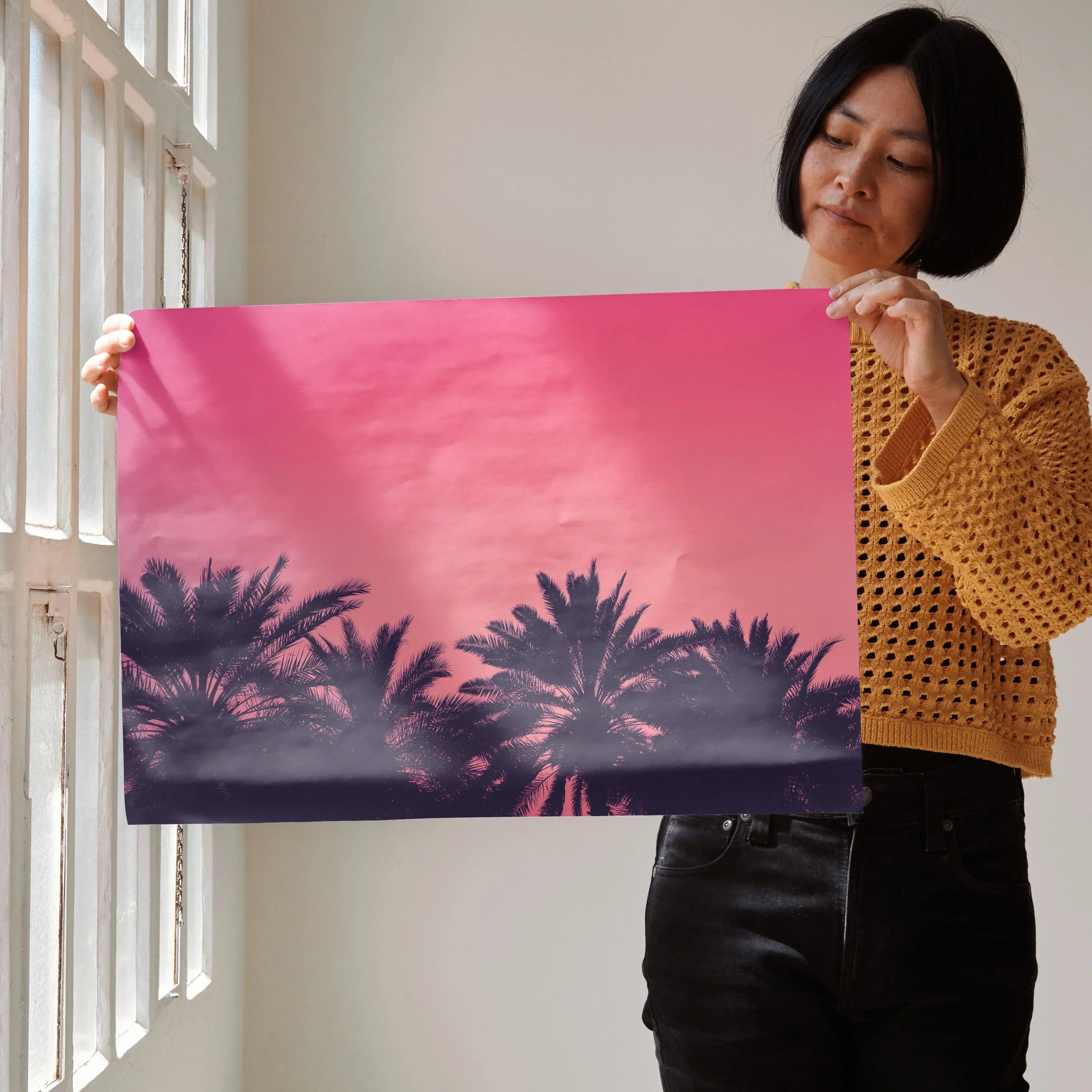 Pink and purple beach sunset poster with silhouetted palm trees wall art.
