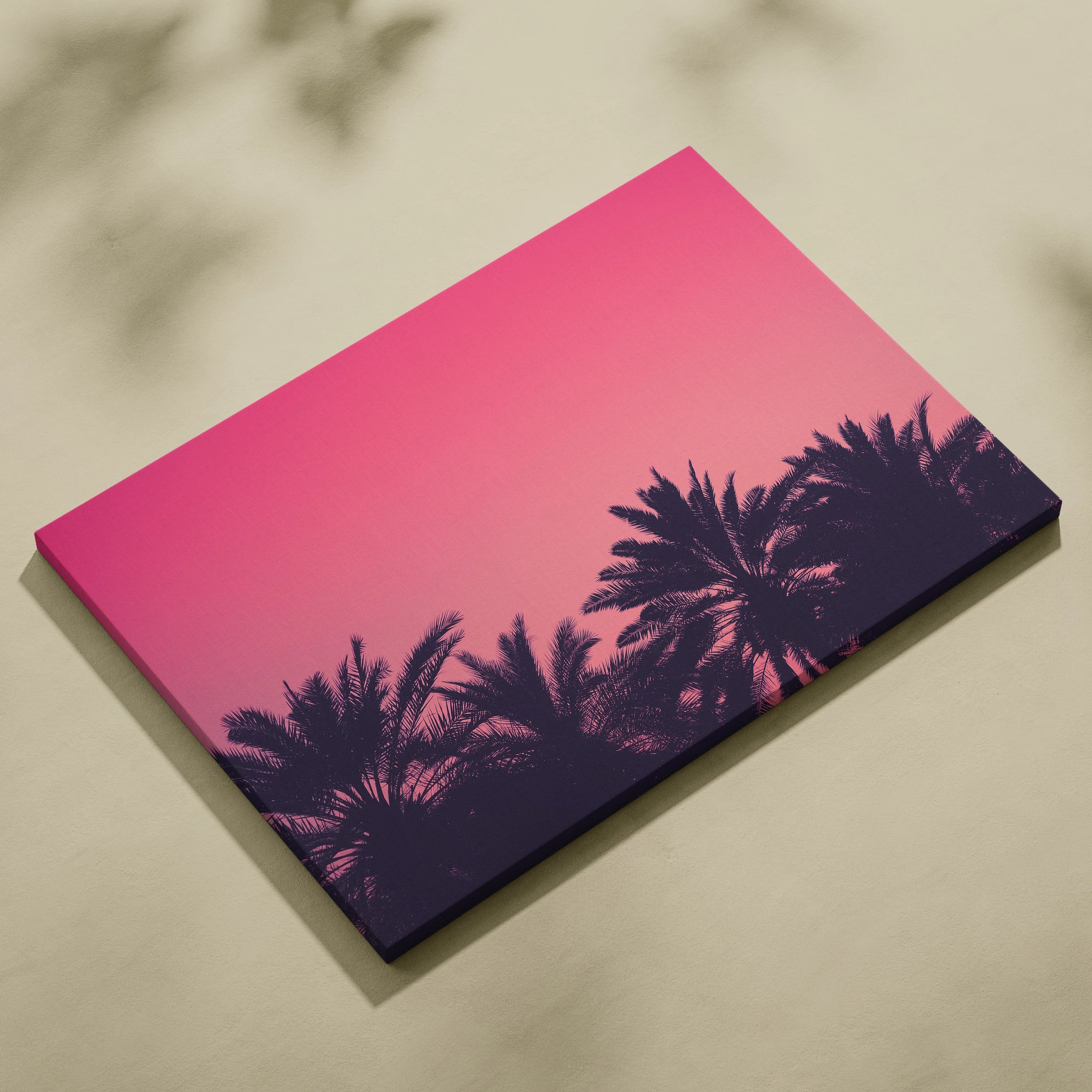Canvas wall art featuring dark palm silhouettes against a pink to red gradient sky at sunset.