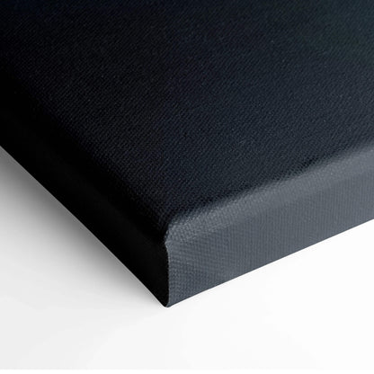 Close-up of black stretched canvas edge for wall art with durable texture.
