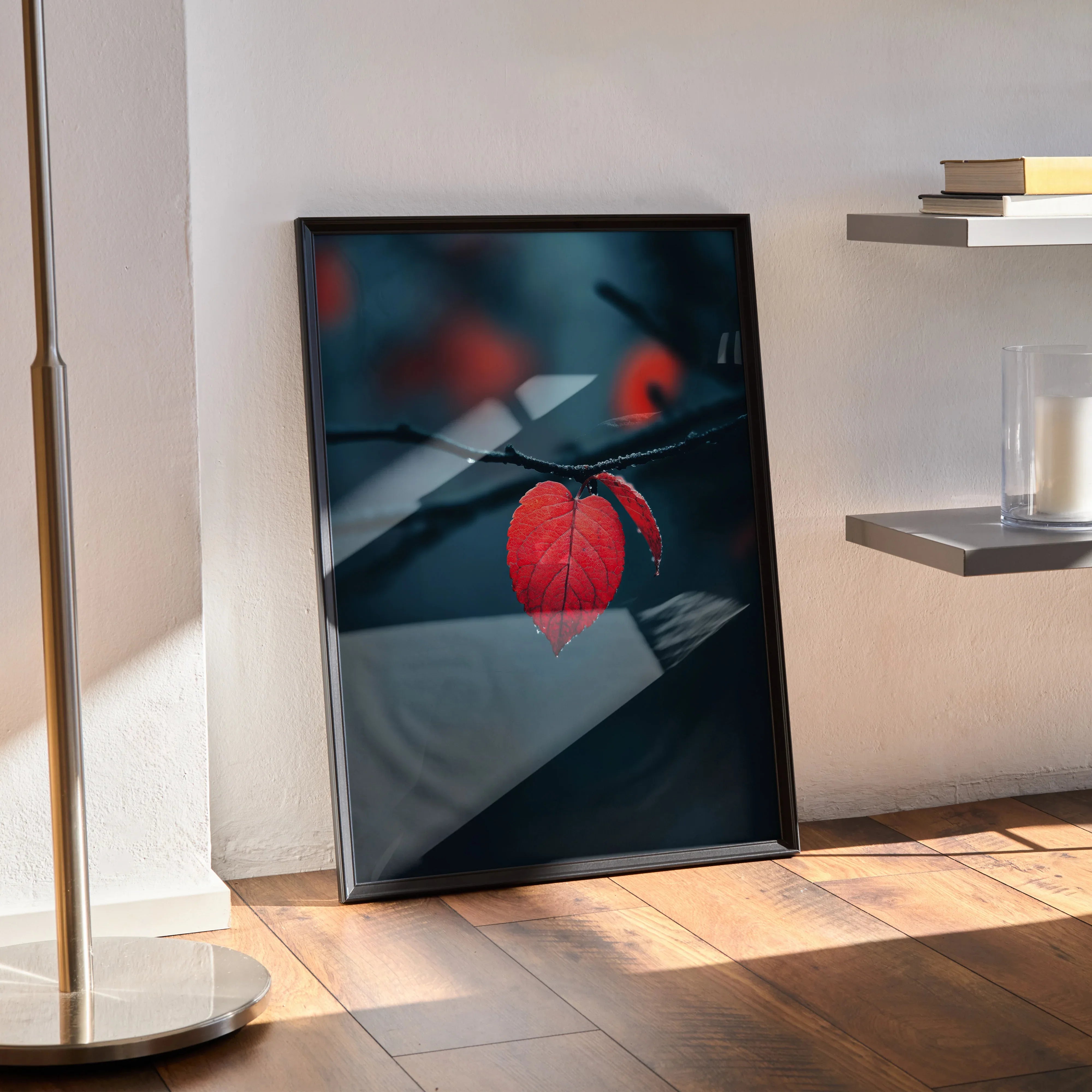 Autumn nature wall art poster featuring vibrant red fall foliage on dark blurred background in black frame.