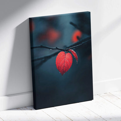 Canvas wall art featuring a vibrant red autumn leaf on a dark moody background.