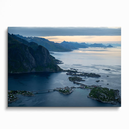 Mountain sunset poster with rugged cliffs and calm sea, nature-themed wall art.