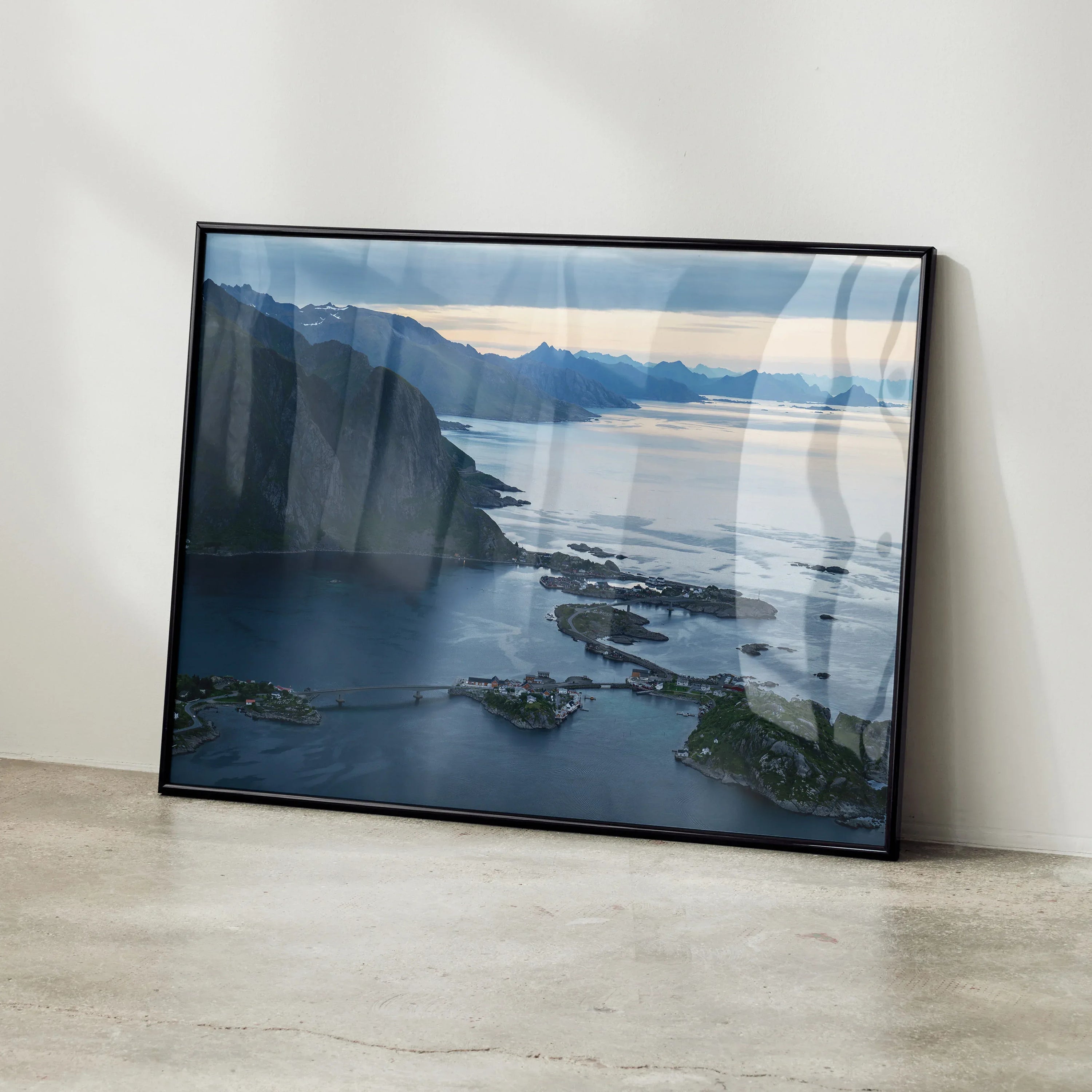 Mountain sunset poster with cliffs and water reflecting soft light, framed wall art.