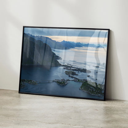 Mountain sunset poster with cliffs and water reflecting soft light, framed wall art.