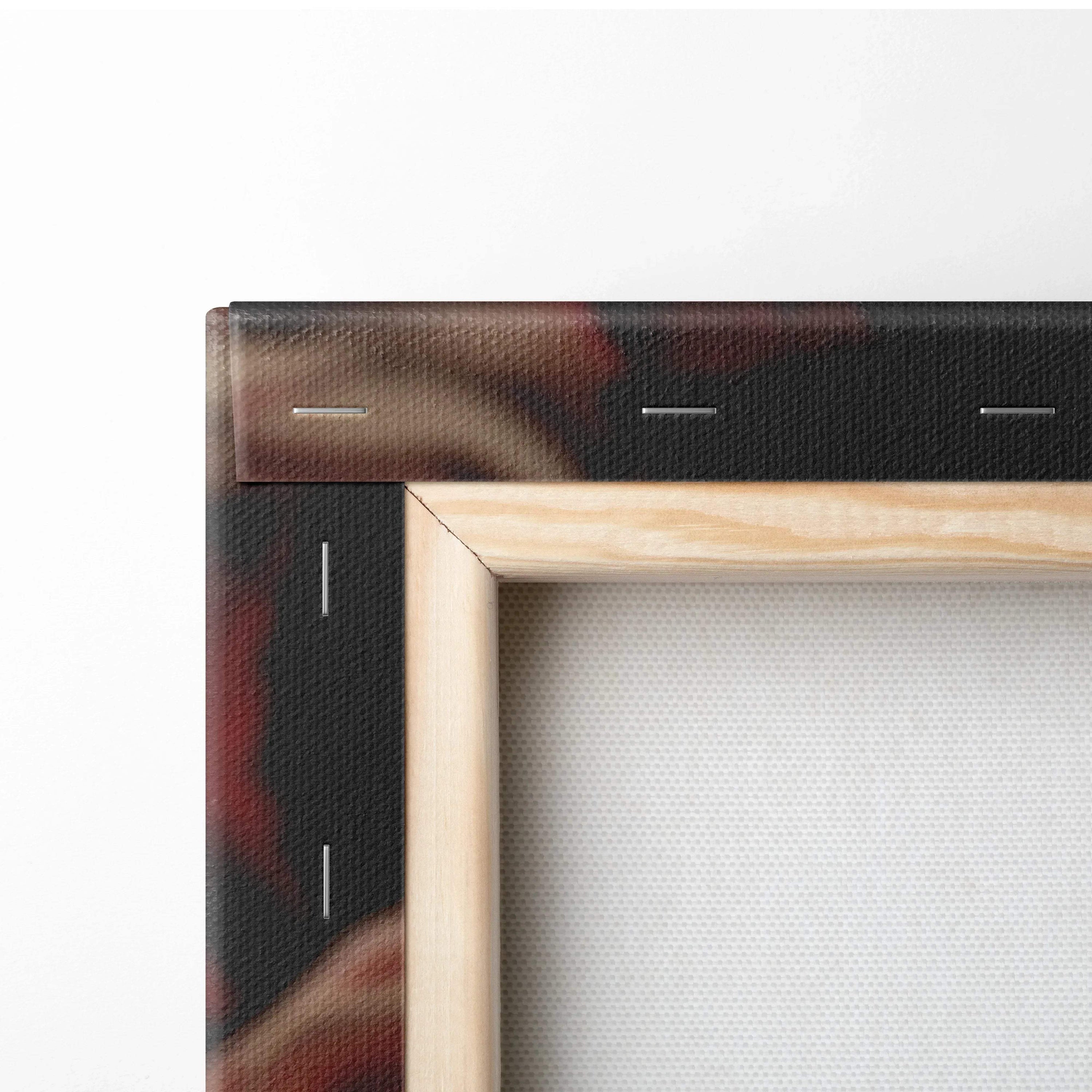 Wooden frame corner with black floral canvas stretched for wall art decor.