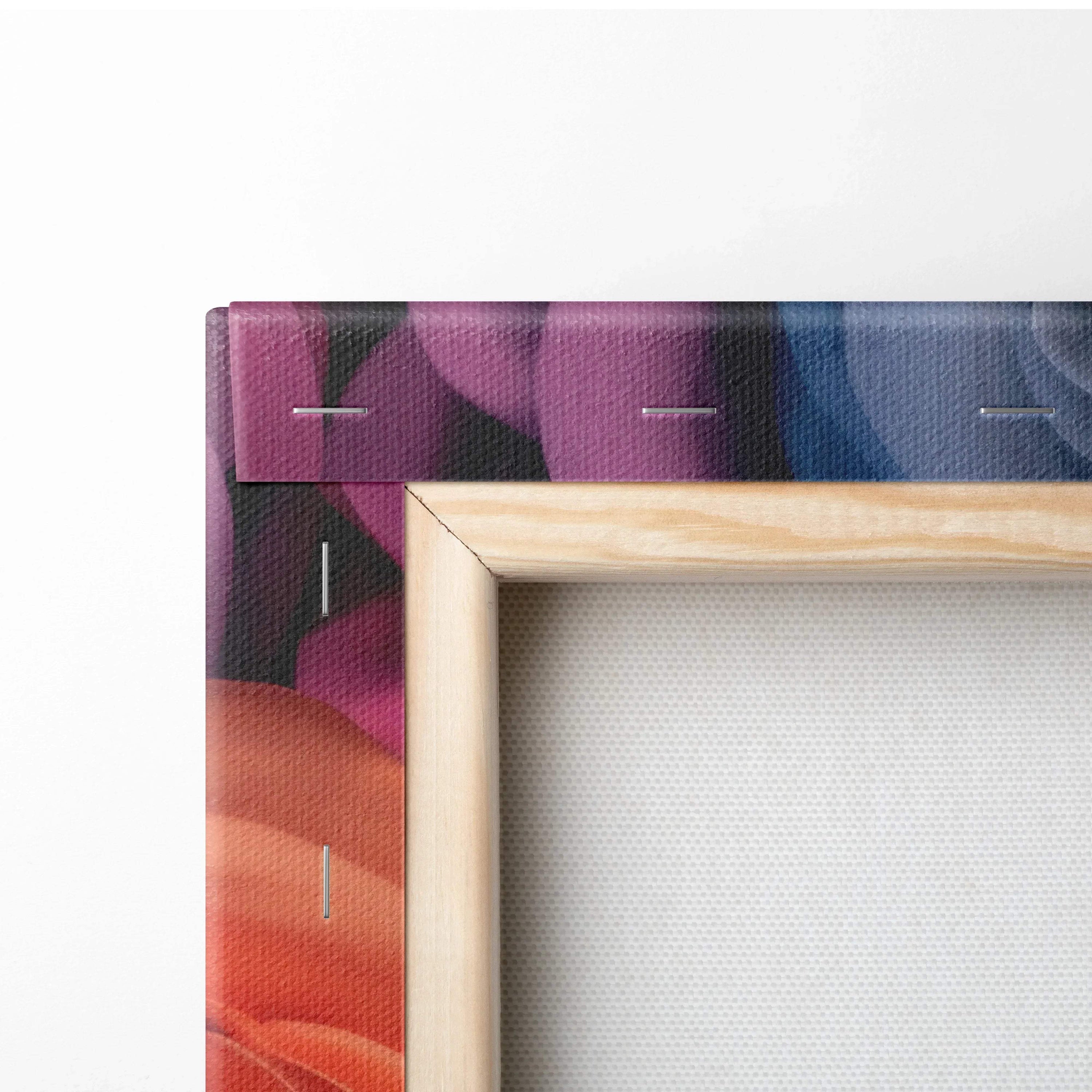 Wood-framed canvas corner with vibrant pastel rose petals in purple, blue, and orange tones.